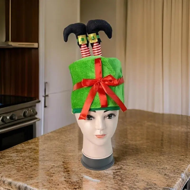 Chapeau Cadeau de Noël avec Jambes